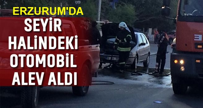 Otomobili yanan sürücünün yardımına polis koştu