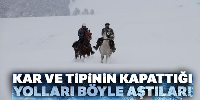 Kar ve tipinin kapattığı yolları atla aştılar