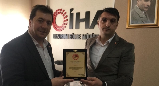 Güvenlik Korucuları ve Şehit ailelerinden İHA’ya plaket