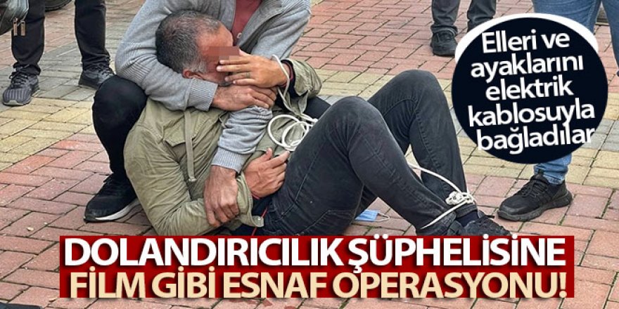 Dolandırıcılık şüphelisi, esnaf tarafından yakalanıp kaçmaması için elektrik kablosuyla bağlandı