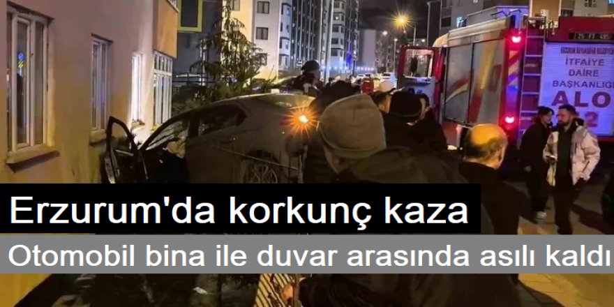 Erzurum'da Otomobil bina ile duvar arasında asılı kaldı