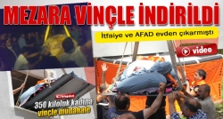 350 kiloluk kadın mezara vinçle indirildi