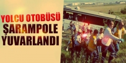 Yolcu otobüsü şarapole yuvarlandı