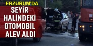Otomobili yanan sürücünün yardımına polis koştu