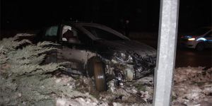 Takla atan otomobilden burnu kanamadan kurtuldu