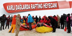 Karlı dağlarda rafting heyecanı
