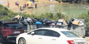 Bodrum'da Sosyete çöplerin arasından denize giriyor