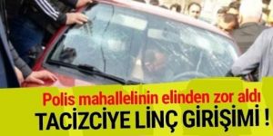 Polis mahallelinin elinden zor aldı