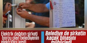 Belediye, dağıtım şirketinin binasını mühürledi
