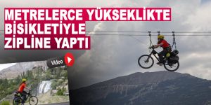 Metrelerce yükseklikte bisikletiyle Zipline yaptı
