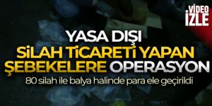 Otomobillerin bagajından 80 silah ile balya halinde para ele geçirildi