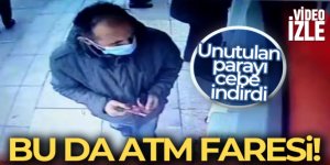 ATM'de unutulan emekli maaşını kapan hırsız kamerada