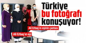 Tepki çeken görüntü! Diyanet İşleri Başkanı'nın eşinin çantasını kadın polis taşıdı