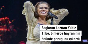 Yıldız Tilbe, binlerce hayranının önünde peruğunu çıkardı