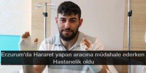 Hararet yapan aracına müdahale ederken hastanelik oldu
