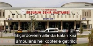 Narman'da Biçerdöverin altında kalan kişi ambulans helikopterle getirildi
